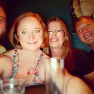 a group of people sitting at a table