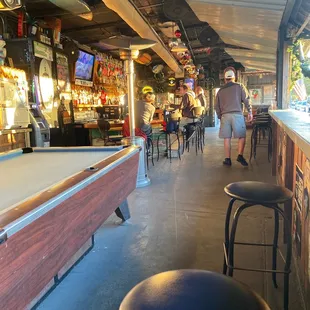 a pool table and bar