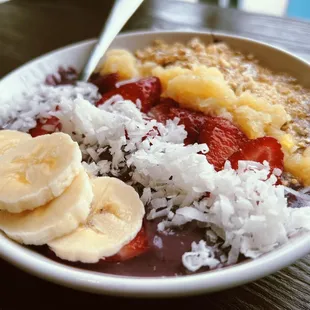a bowl of fruit and rice