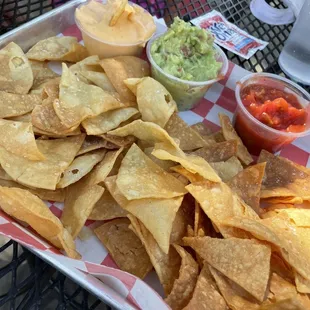 Chips cheese sauce guac &amp; salsa