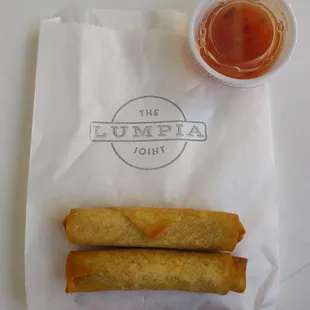 Pork filled lumpia with a sweet chili dipping sauce