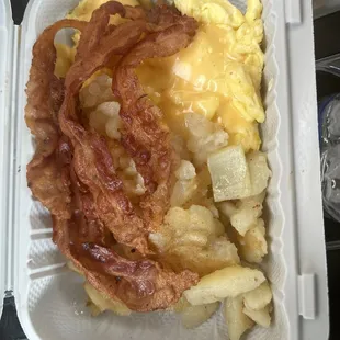 Bacon scrambled eggs with cheese and home fries