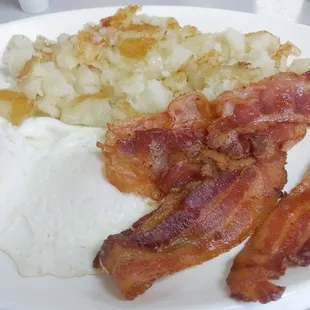 Eggs, bacon, and hash browns-- the perfect diner breakfast served all day at the Lunch Box in Hampden.