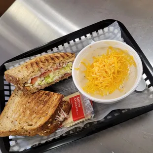 a sandwich and a bowl of soup