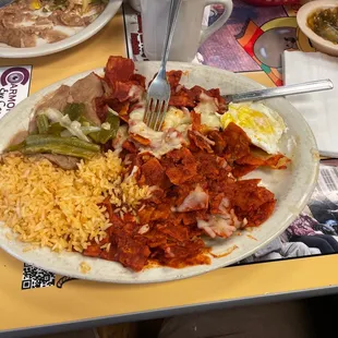 Chilaquiles Red Plate.  The Green ones are tastier.