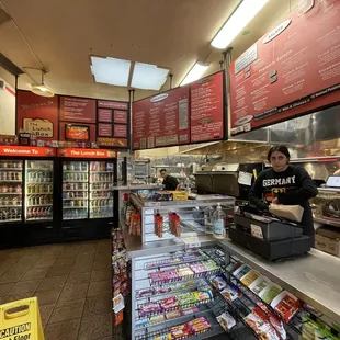 a woman behind the counter