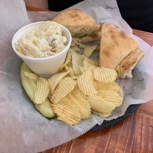 Southwest turkey club with chips and potato salad
