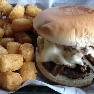 The mushroom and Swiss burger with tots.