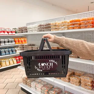a woman shopping in a grocery store