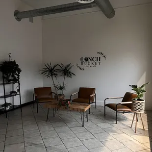 two chairs and a table in a room