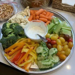 a platter of vegetables and dip