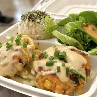 Salmon cakes with salad.