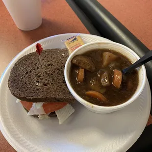 Chicken salad on pumpernickel and veggie soup