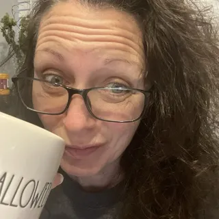 Brandi E.