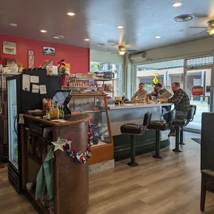 two people sitting at the counter