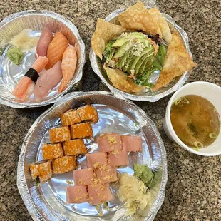 Tasteless fish. Dry rice. Mushy wontons topped with a soggy mixture of fish. Half-full container of soup.