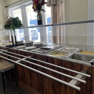 a buffet with a variety of food items
