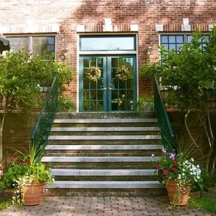 Our lovely garden continues up the steps and onto the back porch.