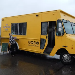 a man standing in front of it