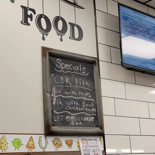 Sign of today&apos; special! Yelp says this place is closed today- Monday. But there are here and we are enjoying!!!