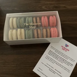 Mixed box macaroons and little card detailing the flavors and care instructions.