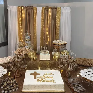 Assorted dipped and drizzled dessert buffet and backdrop decor