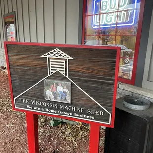 a sign for the machine shed