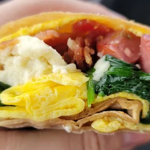 Build your own breakfast burrito (eggs, bacon, spinach, queso fresco, and sausage that was more like kielbasa)