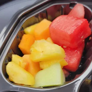 Side of fruit with the build your own breakfast burrito
