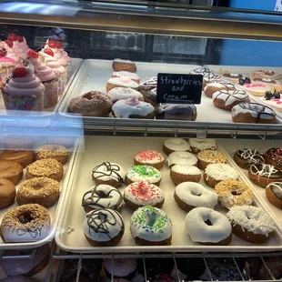 Lots of variety and fancy cupcakes on top.