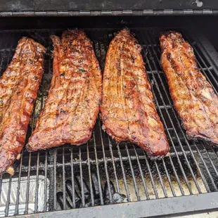 ribs cooking on the grill
