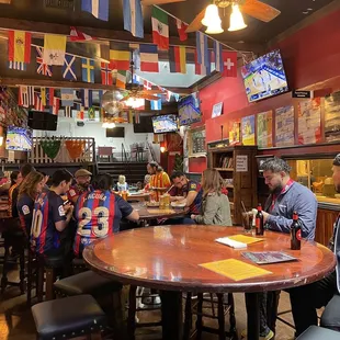 a group of people sitting at a table