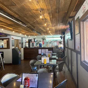 Inside Madhadder!  excited to try the great looking menu! Will definitely be back on the Harley!!! Back patio looks beautiful!!!