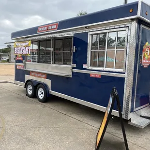 a food truck parked in a parking lot
