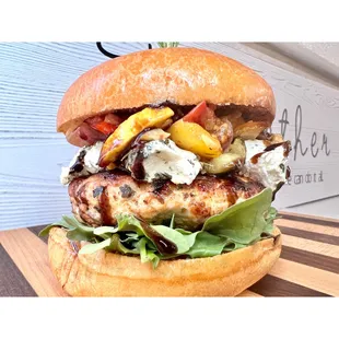Ratatouille Burger - Lemon Rosemary Chicken Patty, Goat Cheese, Ratatouille Bruschetta, Balsamic Glaze On Brioche Bun.