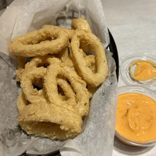 Rubbery calamari with under cooked batter.