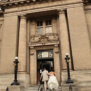 a bride and groom exiting the church