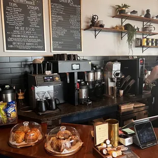 Coffee bar, pastries, and menu