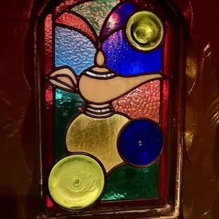 Beautiful stained glass windows and lamps.