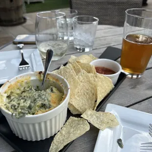 Spinach dip, beer, and Prosecco