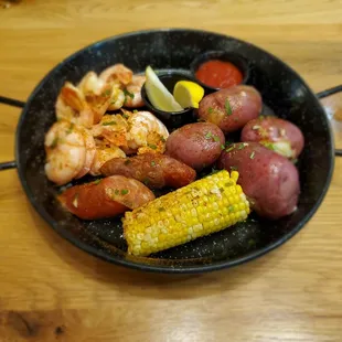 Low Country Boil of shrimp,  sausage, potatoes &amp; corn on the cob!! This is a delicious dish from the Carolinas.