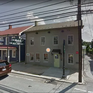 a car parked in front of a building