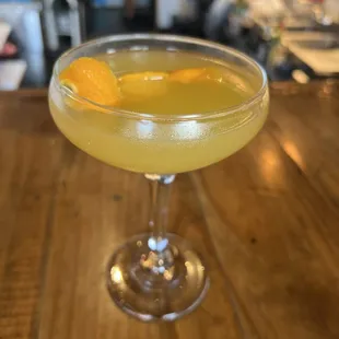 a cocktail in a coupe glass