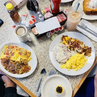 a table full of breakfast foods