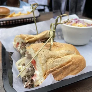 a sub sandwich with toothpicks