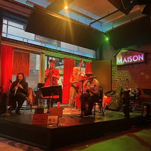 a group of musicians on stage