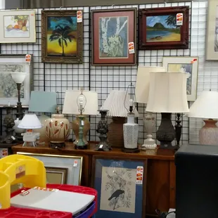 Lamps and artwork in the thrift store