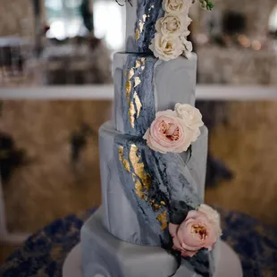 Marbled wedding cake with gold leaf