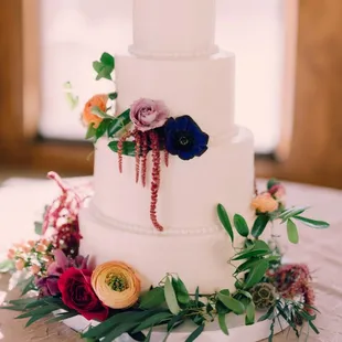 Simple wedding cake with gorgeous fresh flowers