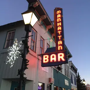 the neon sign for the restaurant